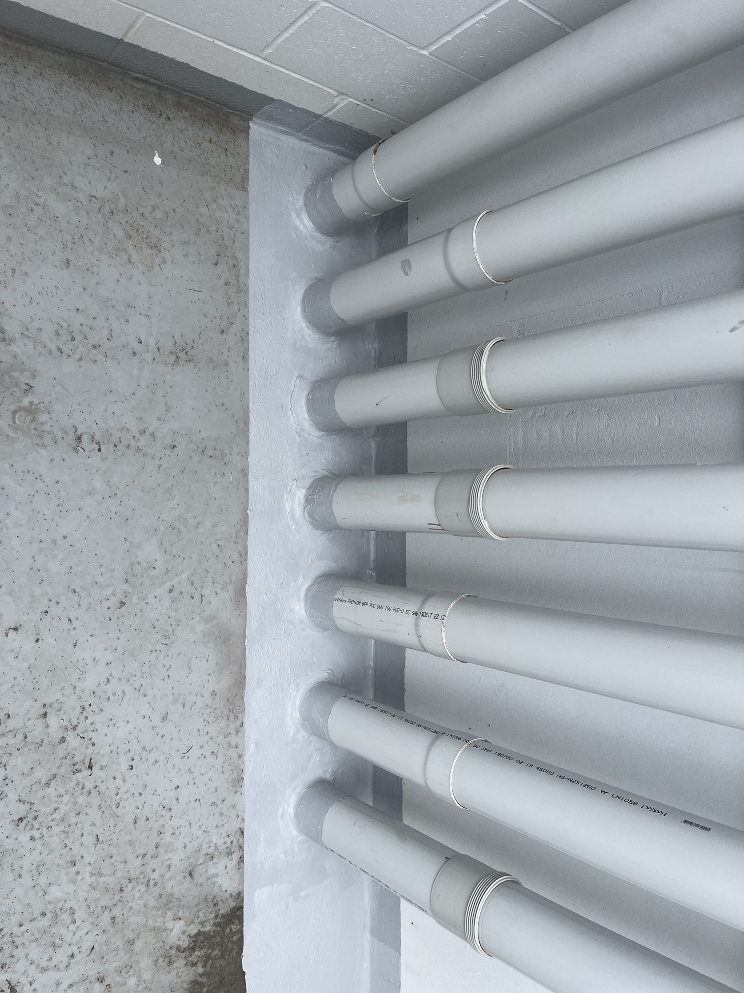 Pipe Penetration or pipe risers on rooftop, with membrane around them.